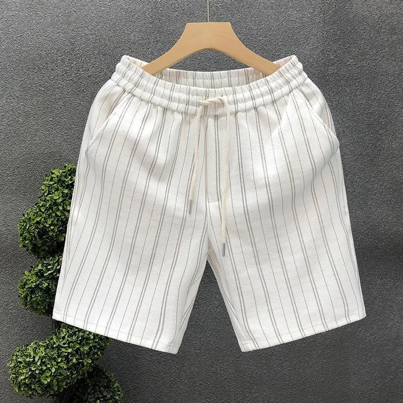 Men's black and white striped casual shorts with straight cut and ankle banded hem