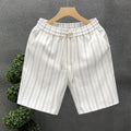 Men's black and white striped casual shorts with straight cut and ankle banded hem