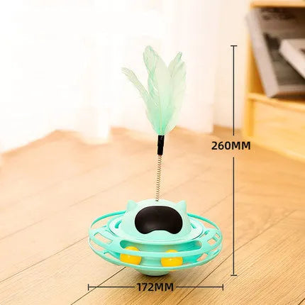 Pink cat tumbler turntable toy with self-hi feature for independent play