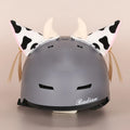Cute plush cartoon character helmet cover and matching hat costume set on a white background.