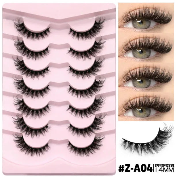Box of artificial fibre false eyelashes in a natural long thick style with a tube of adhesive glue