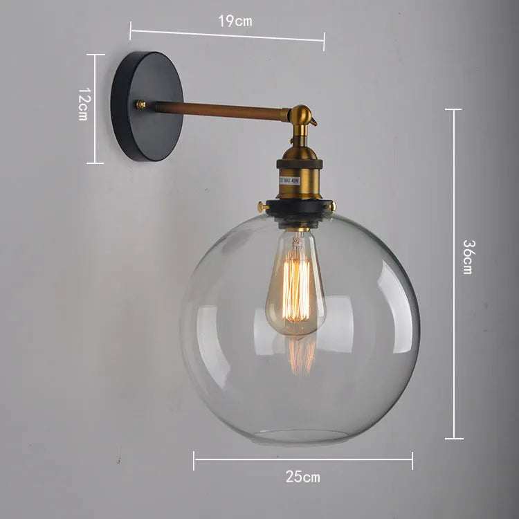Retro round glass wall lamp with aluminium holder, shown in amber, smoky grey, and transparent finishes.