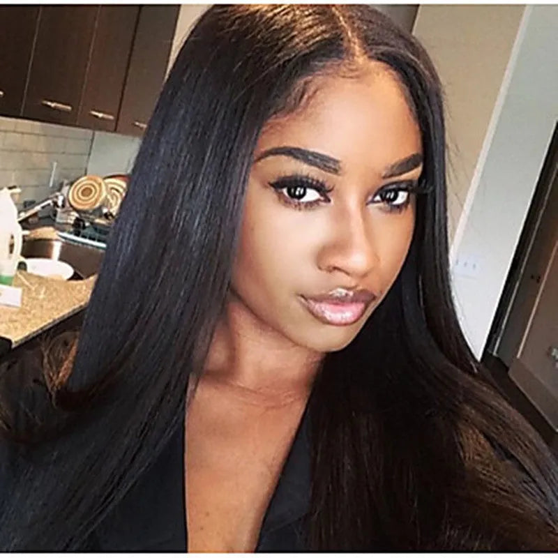 Long straight human hair wig with centre-parted bangs in black colour