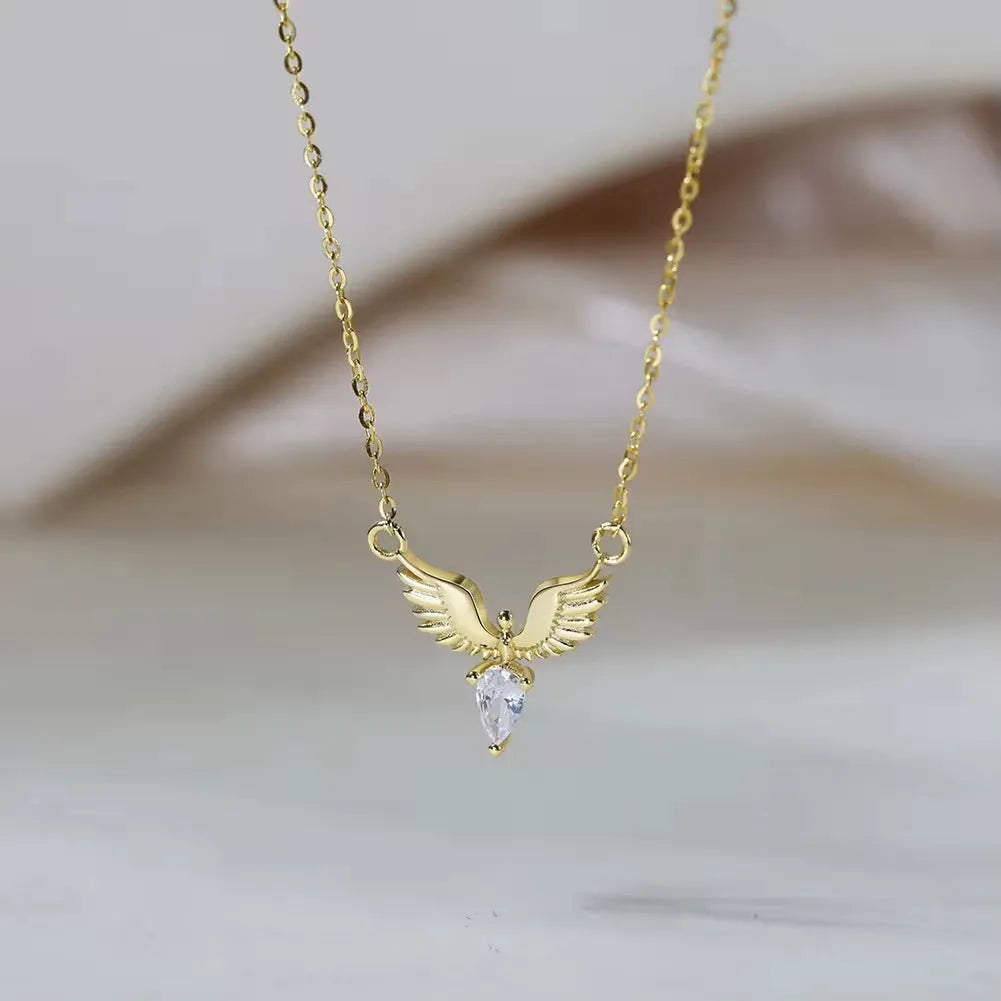 Women's silver eagle pendant necklace with adjustable O-ring chain in white gold or yellow gold colour