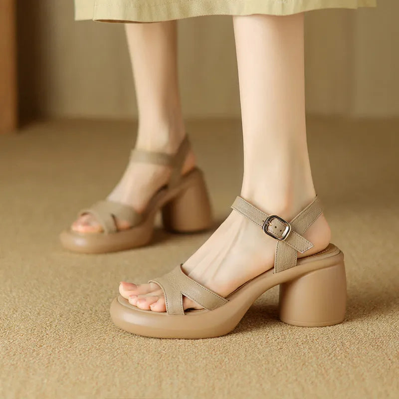 Women's open toe platform sandals in milky white colour showing round toe design and rubber sole