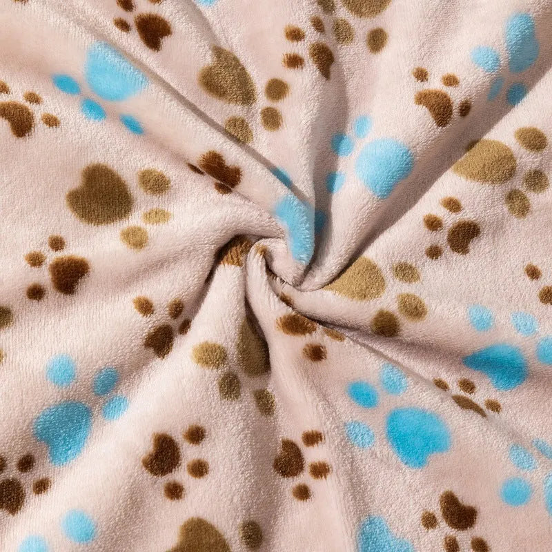 Blue cartoon dog print double-sided thickened flannel pet blanket laid flat.