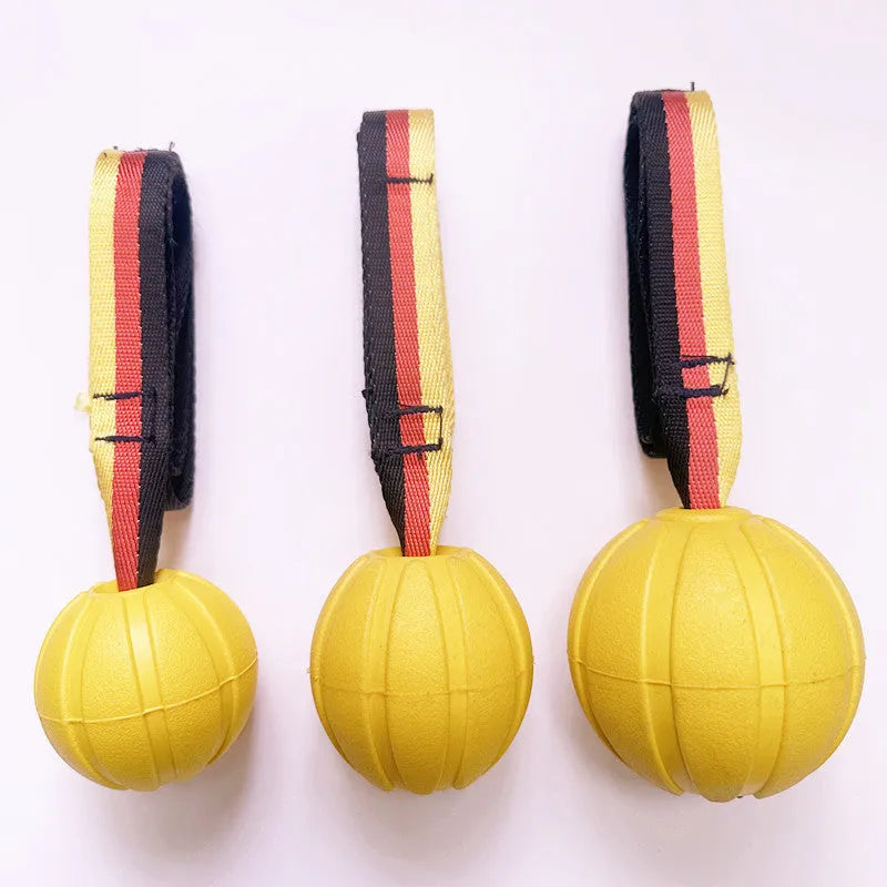 EVA floating dog training ball in camouflage and yellow colours showing three different diameter sizes