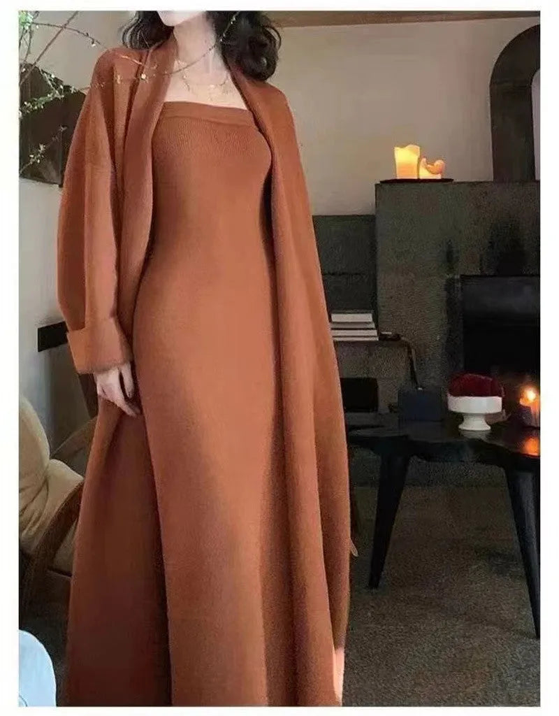 Women's grey knitted cardigan dress and coat suit set with long skirt and flocking detail.