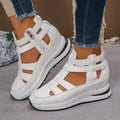 Women's black platform sandals with closed-toe hollow-out design and Velcro fastening