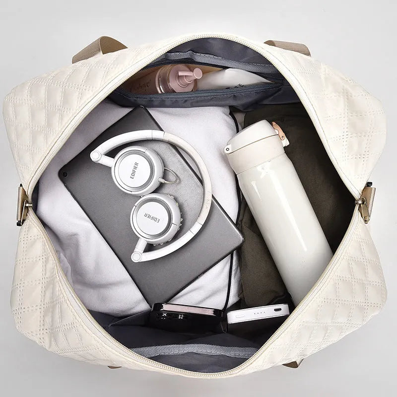 Portable buggy travel bag in Oxford cloth with 36-55L capacity shown in solid colour option