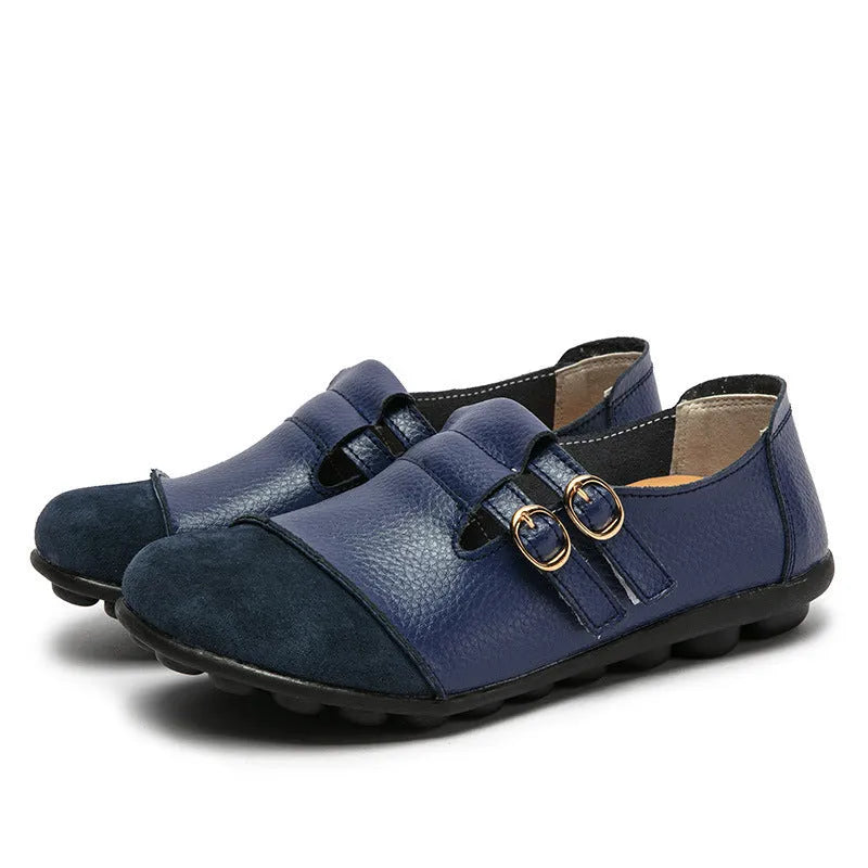 Women's plus size casual flat shoes with Velcro strap and round toe in multiple colours.