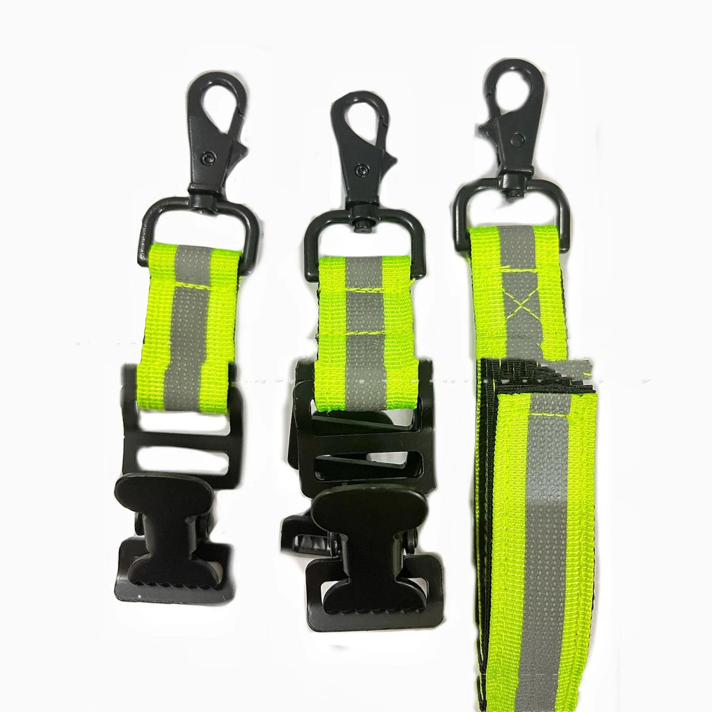 Fluorescent green metal buckle safety clip for organising gloves on industrial gear.