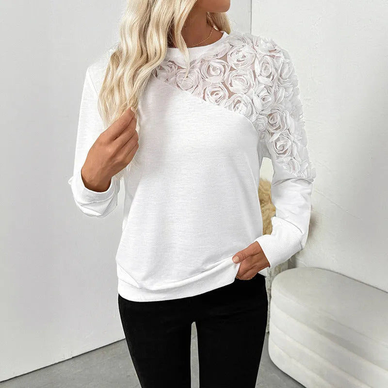 White floral pattern long sleeve women's top with loose pullover fit