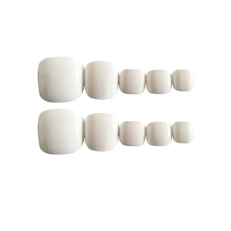 White press-on artificial nails with a starry sky pattern design and included nail glue
