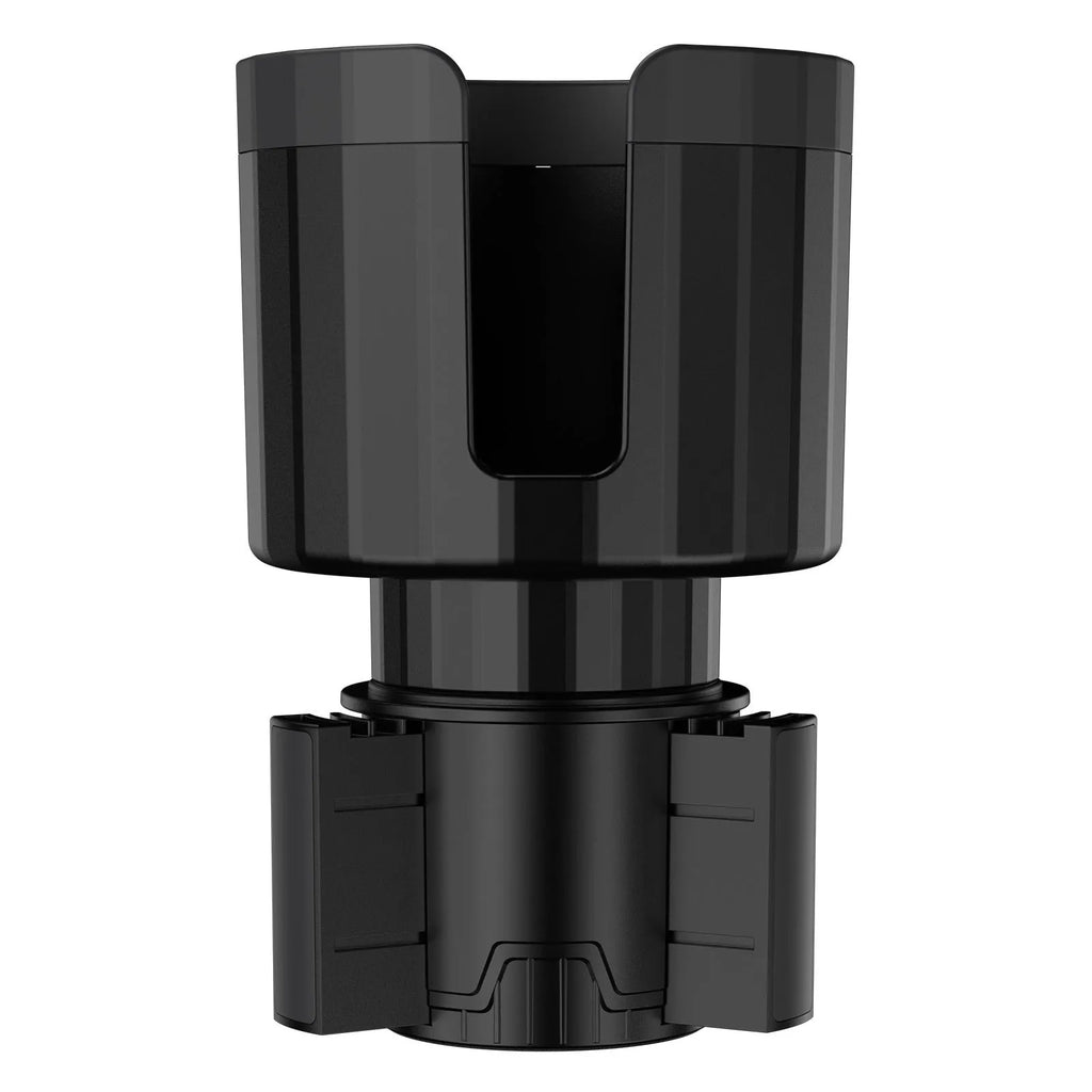 Matte black adjustable car cup holder expander for large bottles and cups on a car centre console.