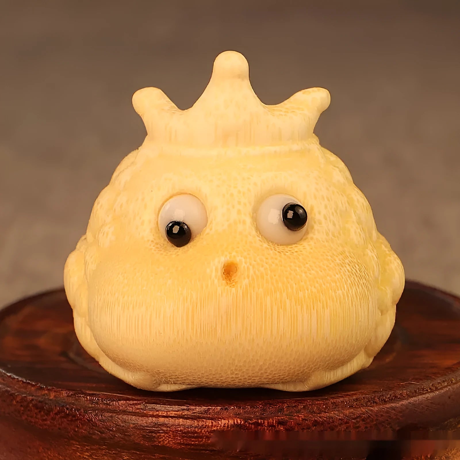 Solid bamboo carving of a Crown Princess toad ornament