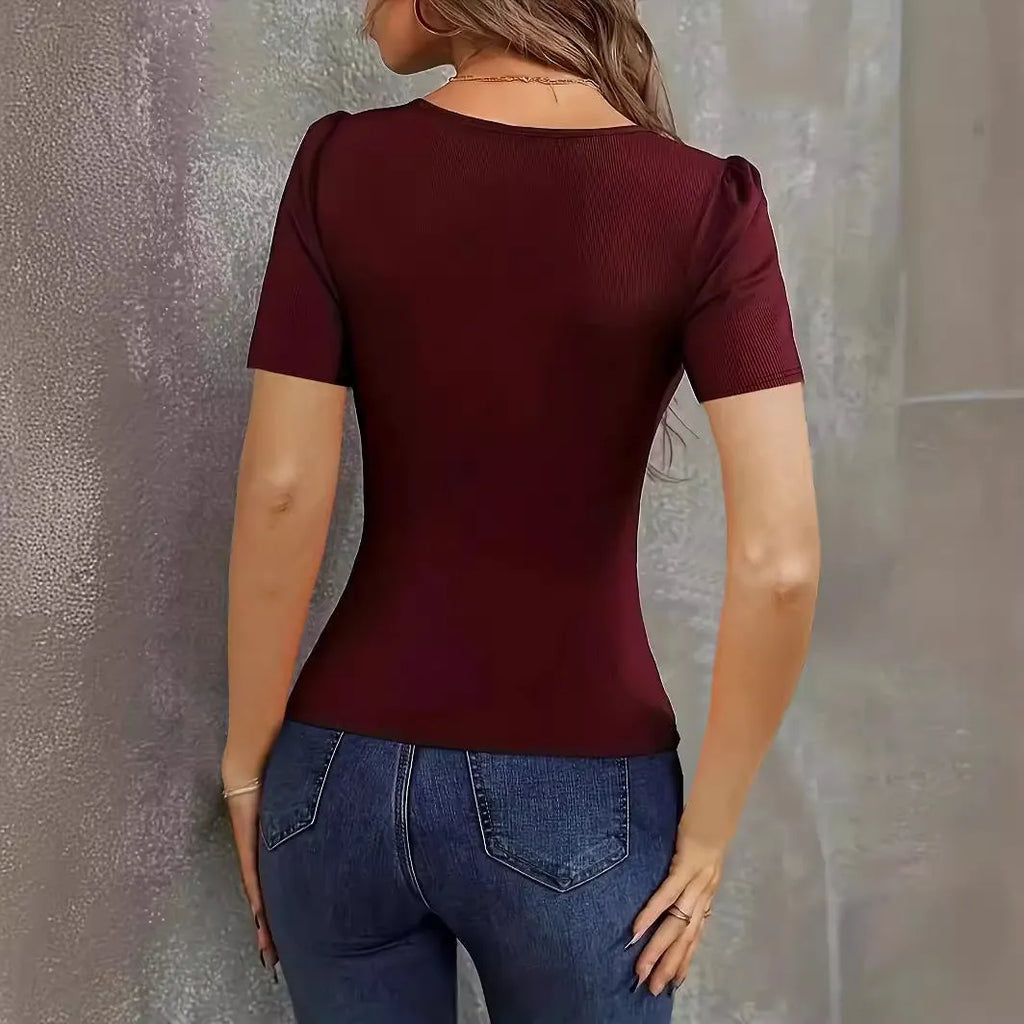 Women's slim fit knitted short sleeve pullover top in wine red, black, or green.