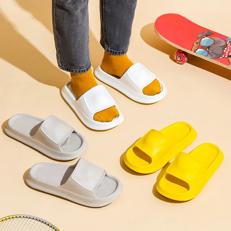 Soft EVA flip-flop slippers with a thick sole, shown in multiple colours including black, pink, and grey.