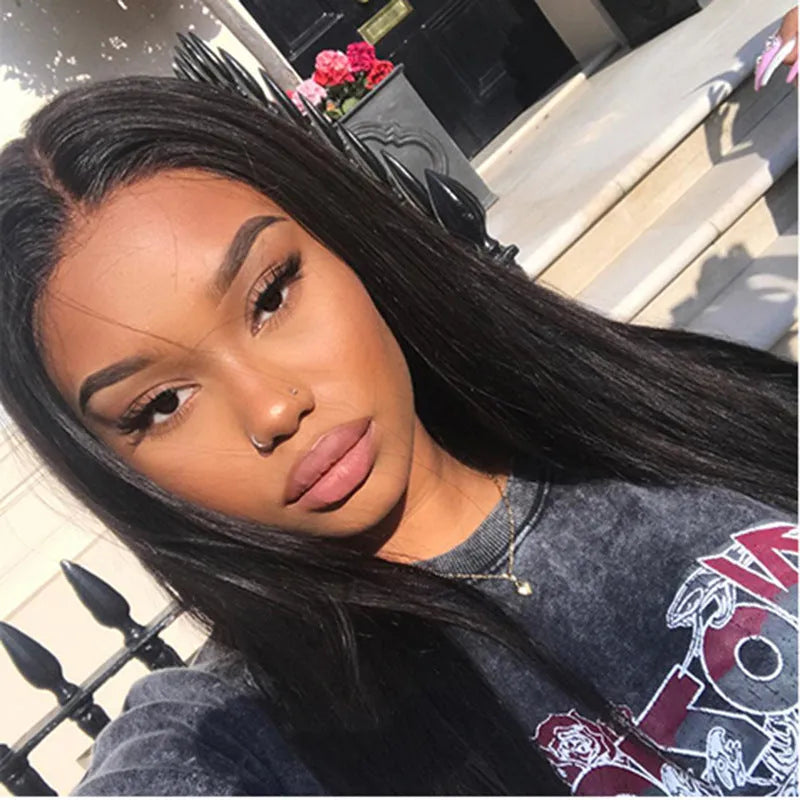 Long straight human hair wig with centre-parted bangs in black colour
