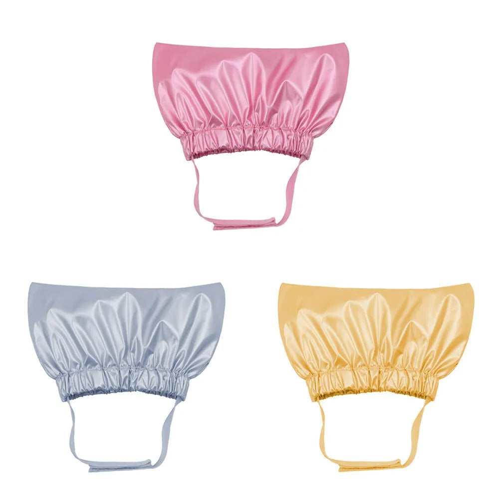 Adjustable waterproof shower cap for pets in silver, pink, or gold, shown in small and medium sizes.
