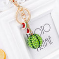 Green watermelon-shaped zinc alloy keychain measuring 12cm with metal construction