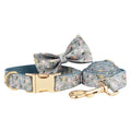 Blue floral pattern dog collar made from polyester cotton fabric with adjustable strap and decorative bow accessory.