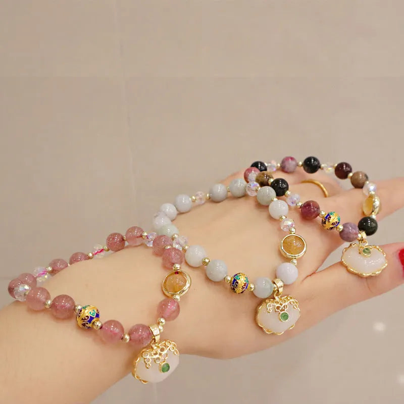 Gray jade and strawberry quartz women's bracelet with geometric ethnic metal decorations
