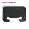 Foldable black car laptop stand with integrated drink holder placed on steering wheel