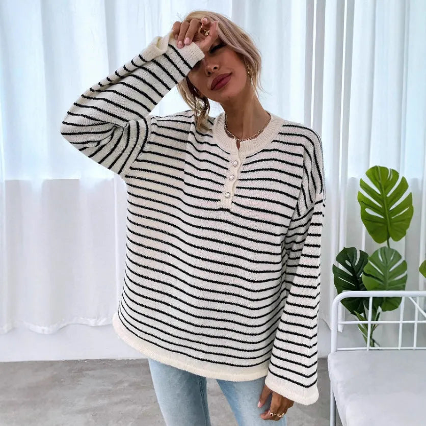 Women's black striped loose top with drop-shoulder sleeves and button details