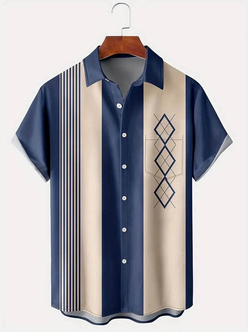 Man wearing a loose fit plaid short sleeve shirt with a lapel collar in a casual setting.