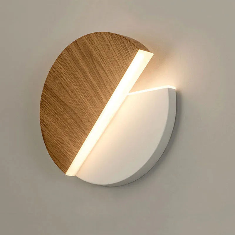 Rotating round LED wall light with warm light, 220mm diameter, wrought iron acrylic, black white finish