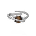 Silver Saturn design open ring with adjustable opening and white gold colour finish
