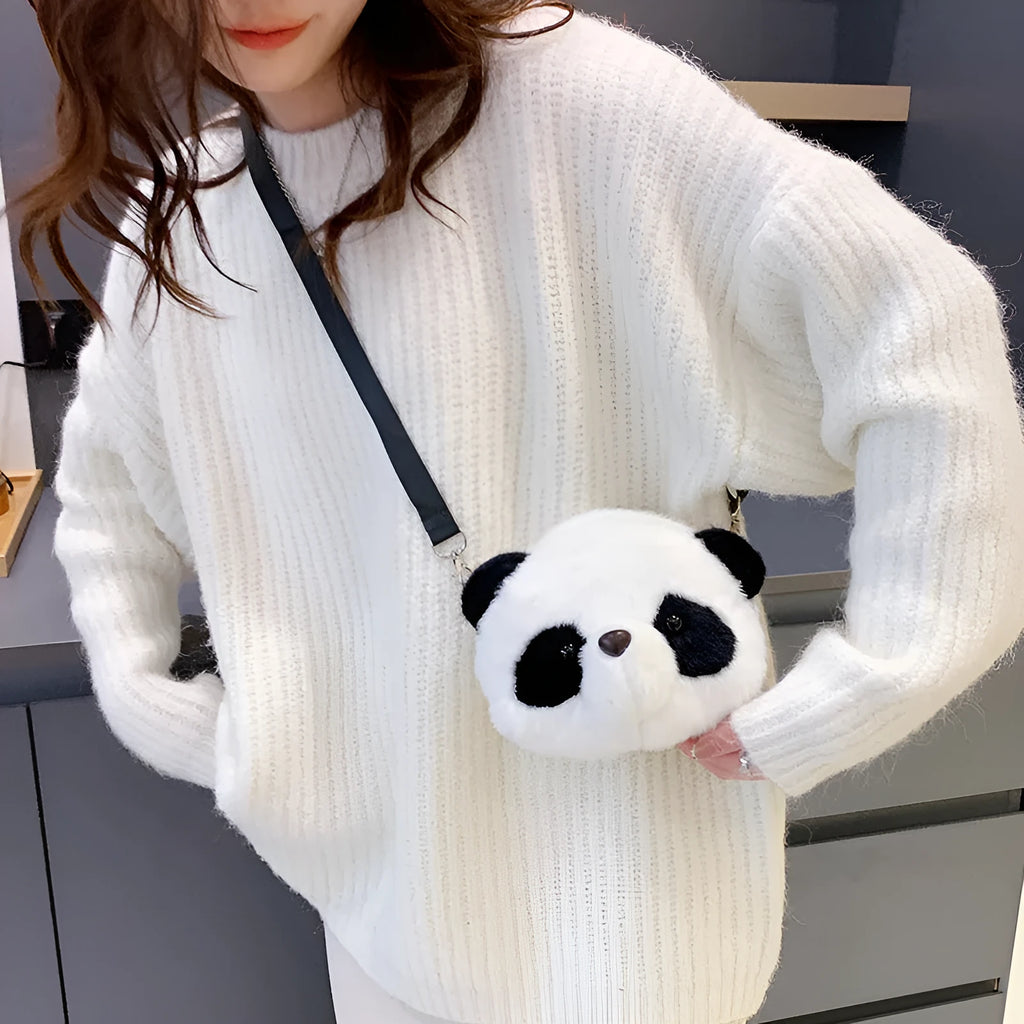 Soft plush panda head design crossbody bag shown in cylindrical shape.