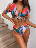 Red women's split swimsuit with skirt design and American print pattern for swimming