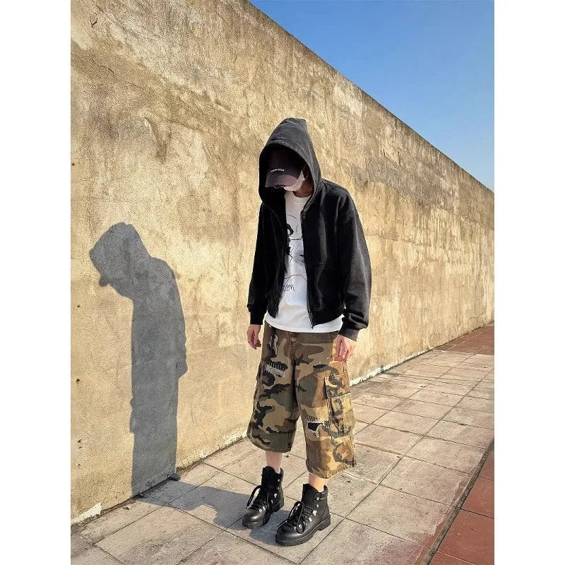 Men's camouflage cropped jeans with retro patch and ripped detailing in straight-leg loose fit