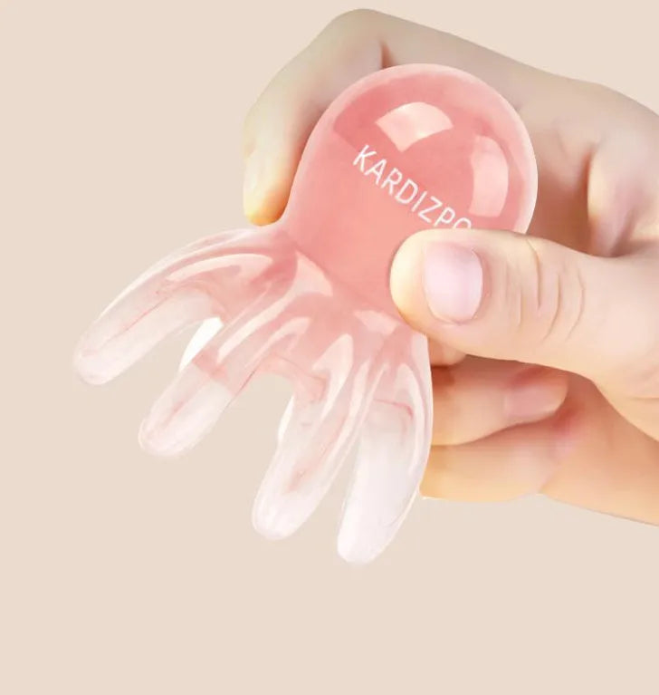 Pink octopus-shaped massage comb made from natural resin with storage bag for facial and head massage