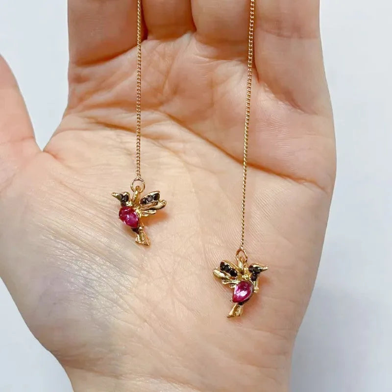 Women's personalised bird hanging long style earrings with mixed zirconium wings in three colour options