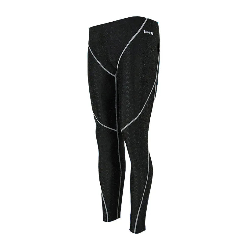 Men's nylon cropped swimming trunks in black with line pattern detail