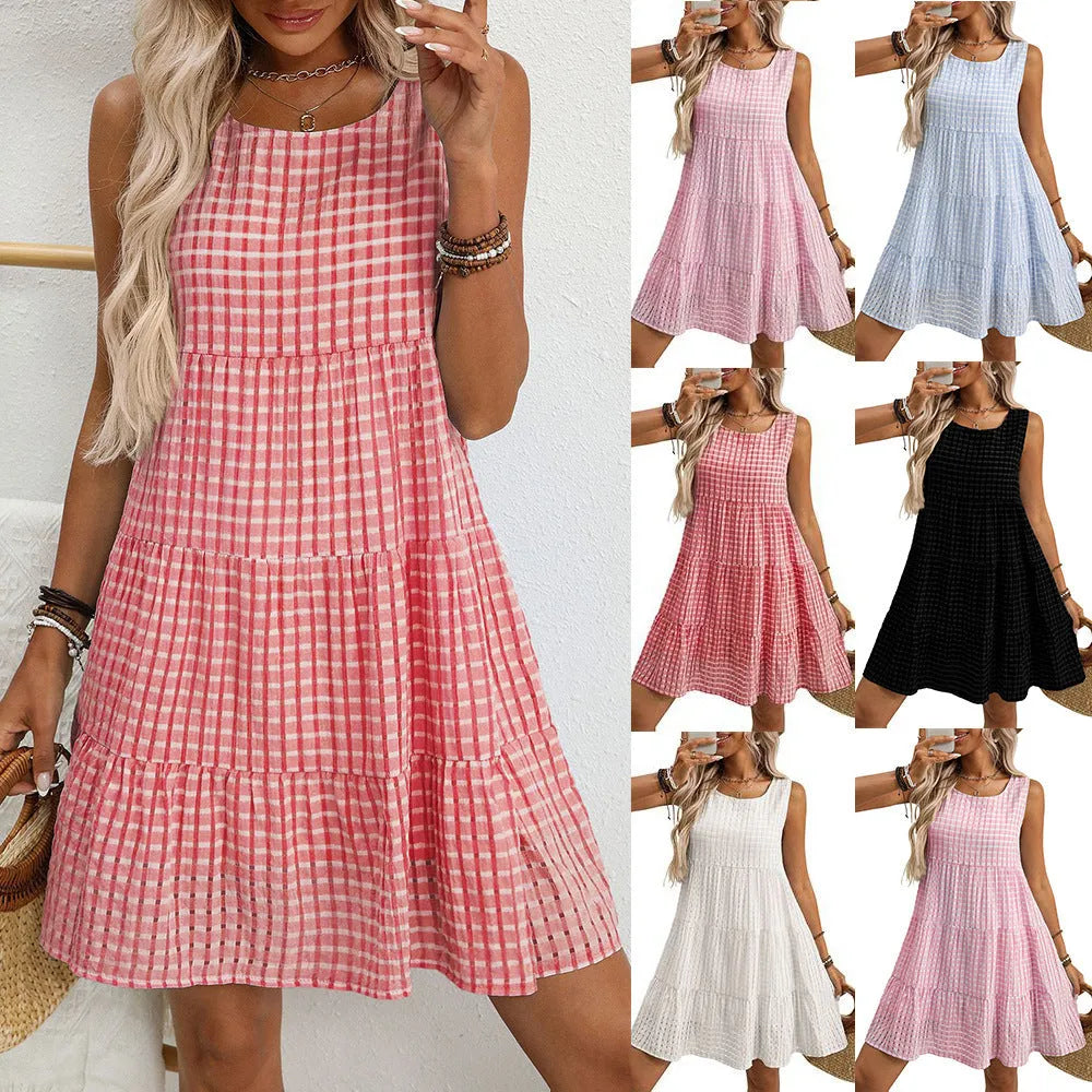 Women's light blue sleeveless plaid dress with loose swing skirt and high waist on a model.