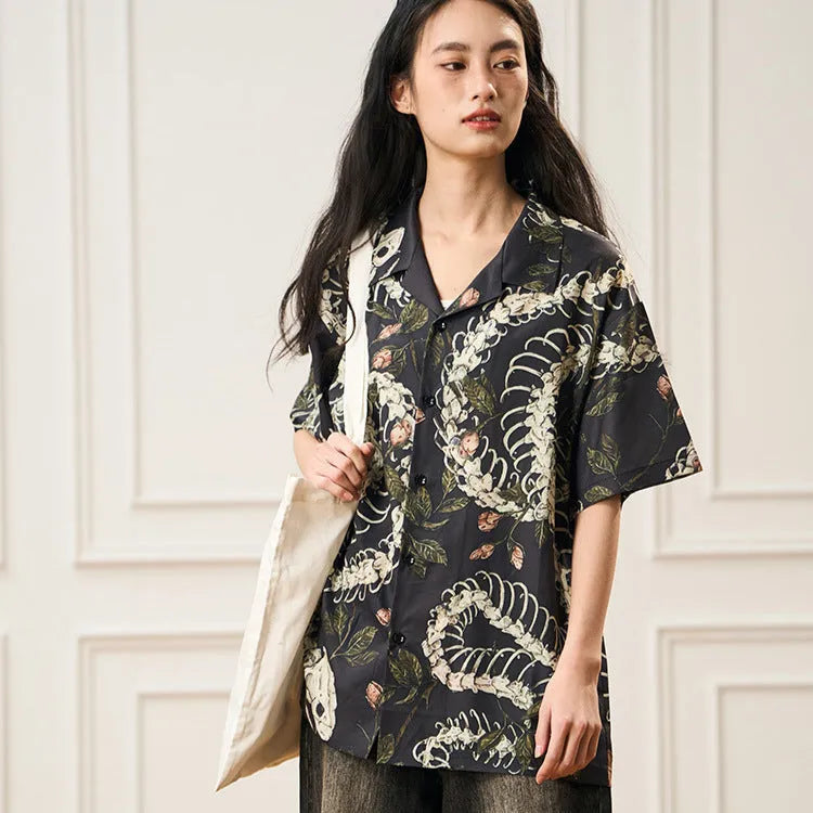 Short sleeve Cuban collar shirt with snake bone and floral pattern print in loose fit design