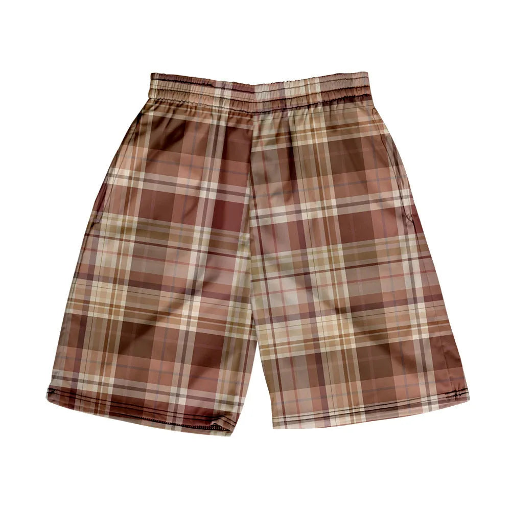 Man wearing straight-fit plaid casual shorts with an elastic waistband.