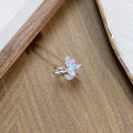 Adjustable copper insect ring with hand-dripped oil finish in silver, pink, or blue colour variations