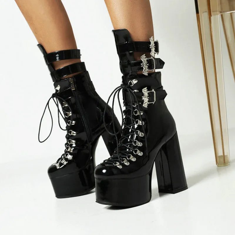 Chunky high-heel platform thigh-high boots in black patent leather with front lacing and block heel