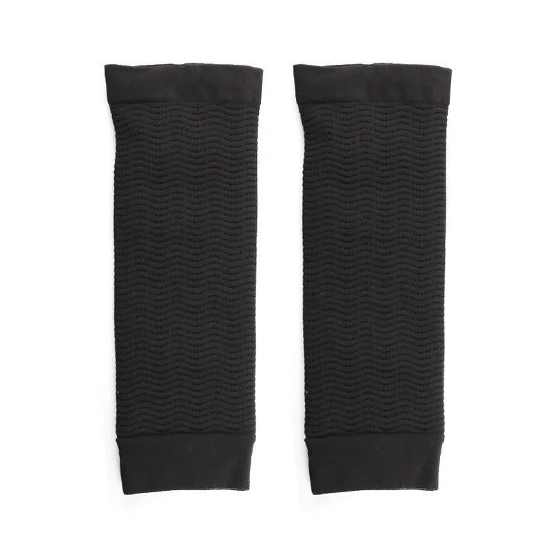 Women's black and skin tone shaping arm sleeves made from nylon fabric for upper arm coverage