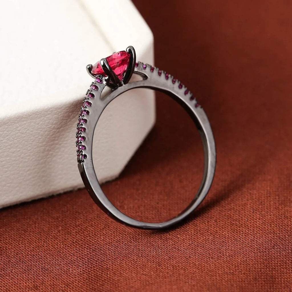 Geometric hexagon copper ring with colourful zircon stone in gun black finish.