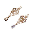 Small water drop pendant with hollow crown design and zircon accents in five colour options