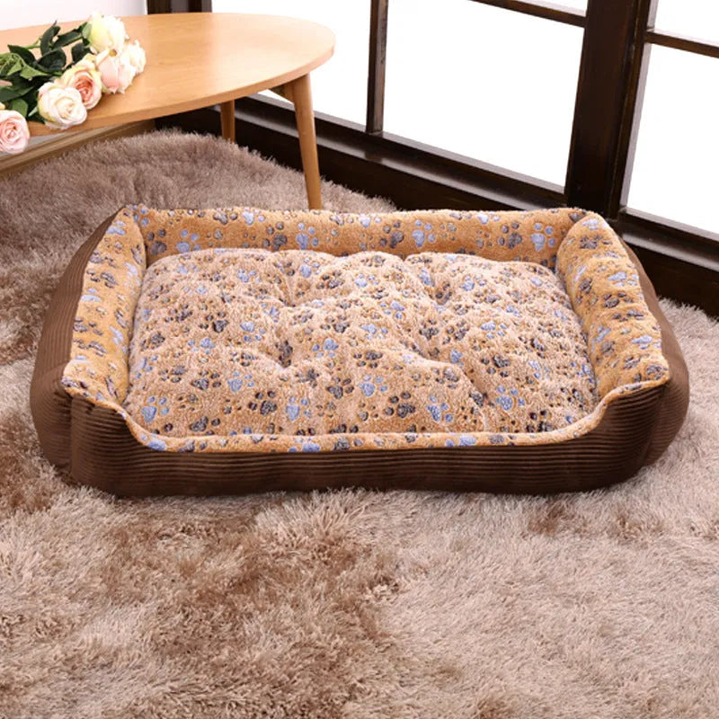 Beige plush pet dog bed with raised sides, shown next to a small dog.