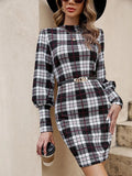 Black tight dress with lantern sleeves and leather stitching detail, mid-length design