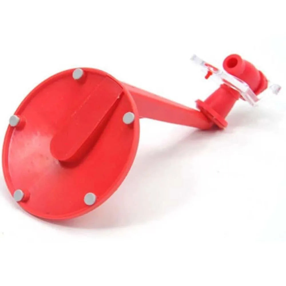 Red plastic Magic Tap soda bottle dispenser attached to an inverted 2-litre bottle.