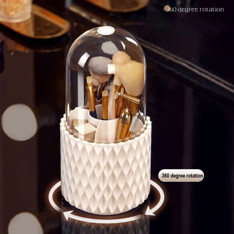 White rotating transparent makeup brush storage box with lid on desktop